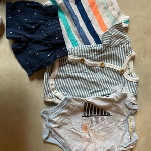 Bunch of newborn outfits